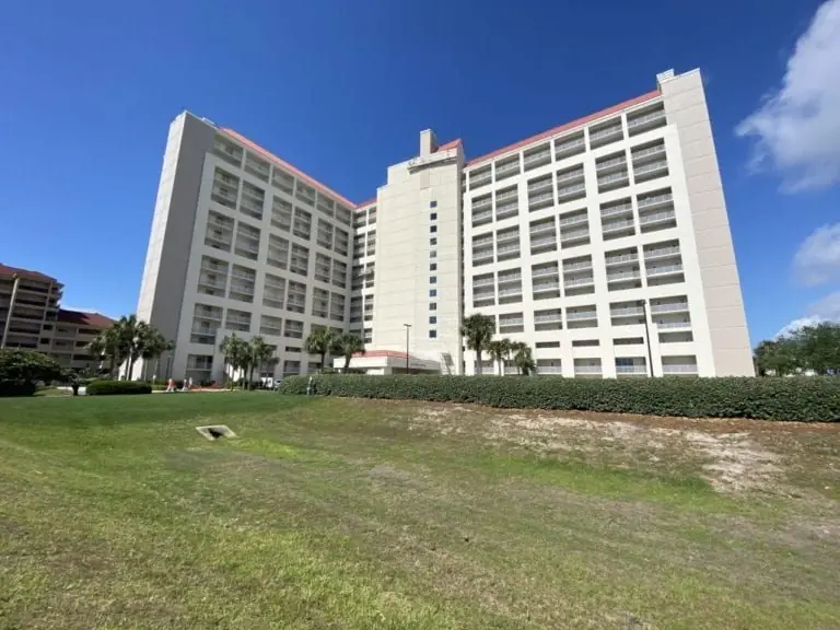 Tides at TOPS'L condominium tower viewed from the beach side during exterior restoration, Miramar Beach, Florida.